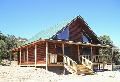 Photos of a log cabin in Catron County, New Mexico
