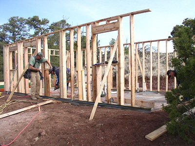 Photo of a frame house under construction