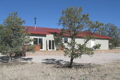 Photos of a structural insulated panel home in Catron County, New Mexico